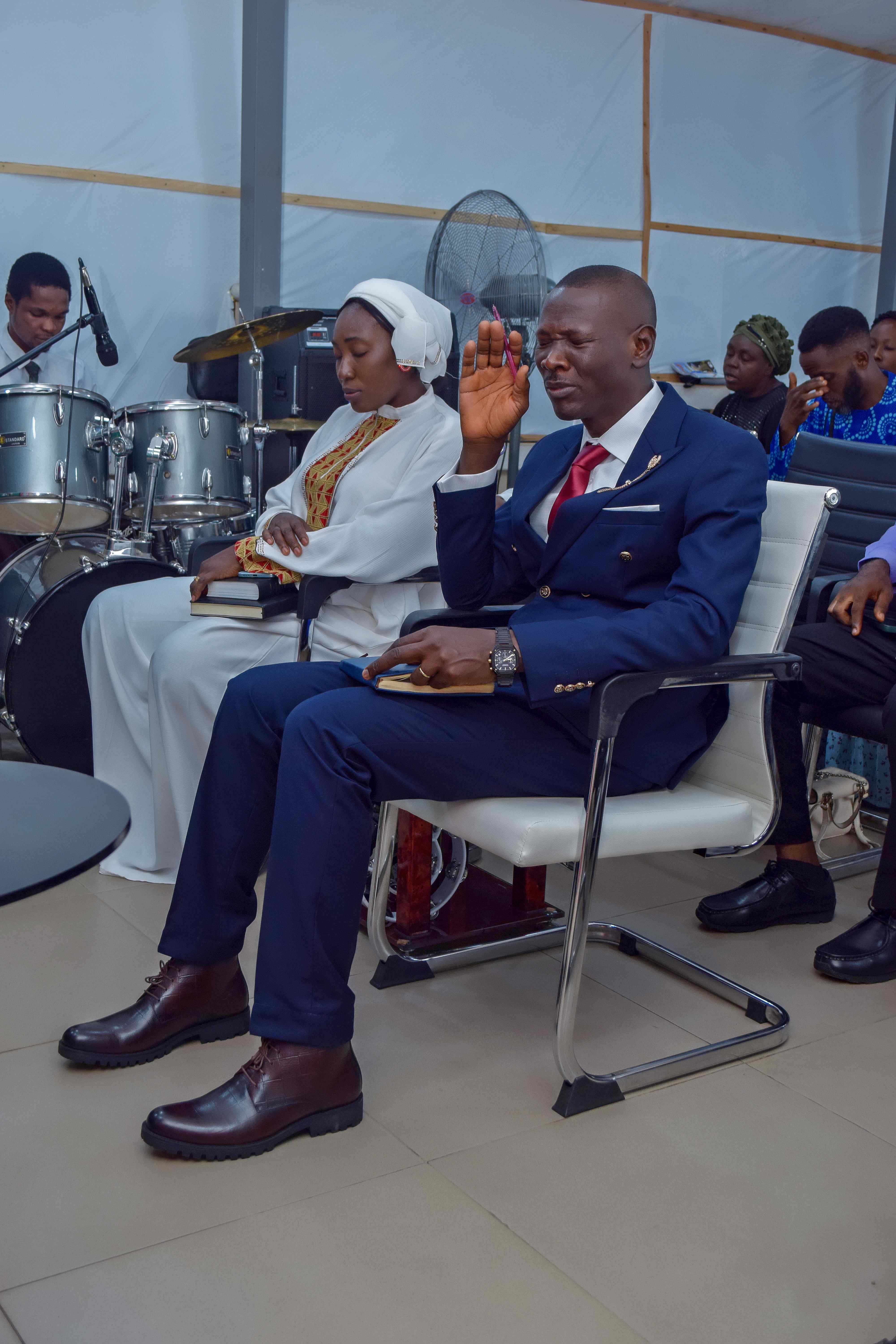 Pastor & Wife in Worship